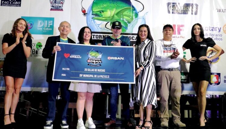 cheque del torneo de pesca orsan en beneficio de dif la paz