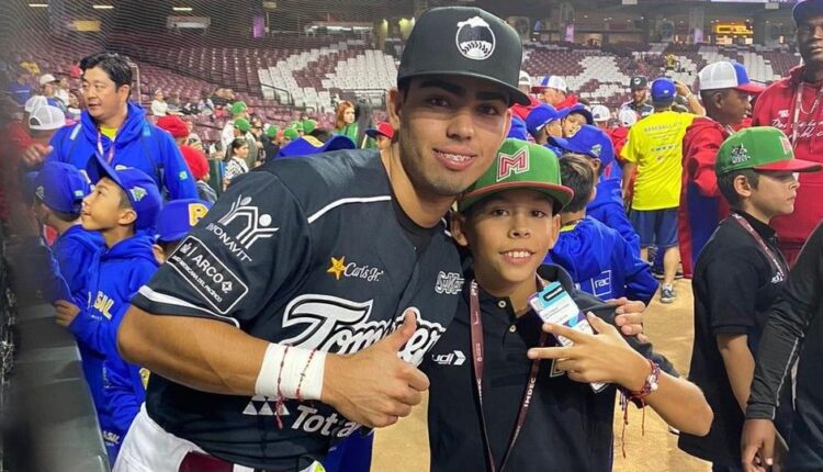 Christian Lucero junto a Andrei Bertrand